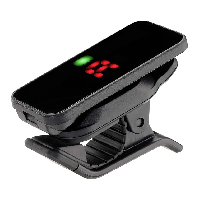 Korg Pitchclip PC-2 clip-on tuner attached to a guitar headstock